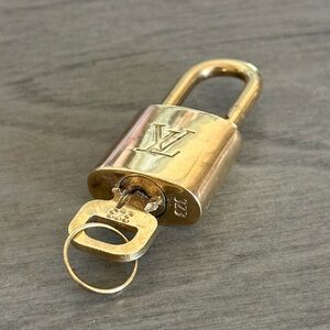2 piece Louis Vuitton 323 lock and key